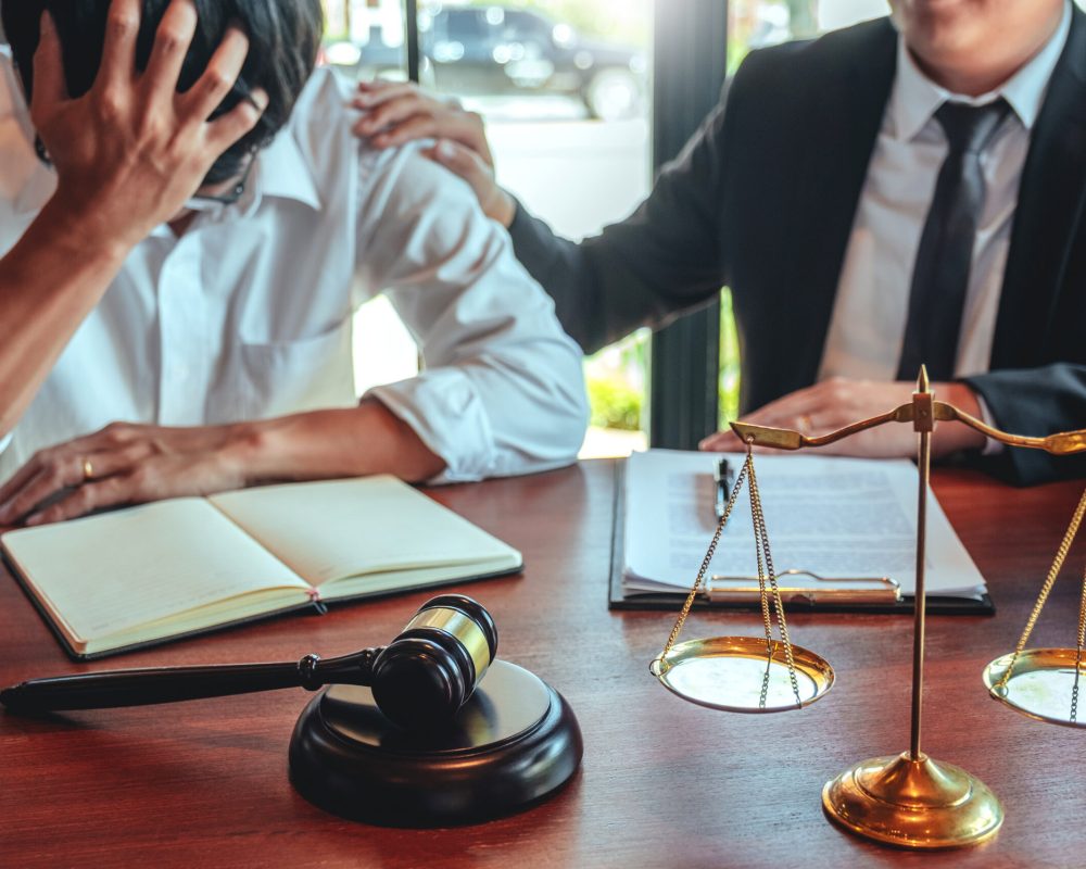 Businessman shaking hands to seal a deal Judges male lawyers Con Businessman shaking hands to seal a deal Judges male lawyers Consultation legal services Consulting in regard to the various contracts to plan the case in court.