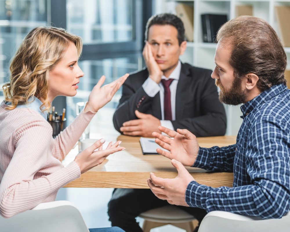 side-view-of-couple-arguing-at-workplace-in-lawyer-office.jpg side-view-of-couple-arguing-at-workplace-in-lawyer-office.jpg
